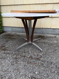Atomic dining table and 2 chairs