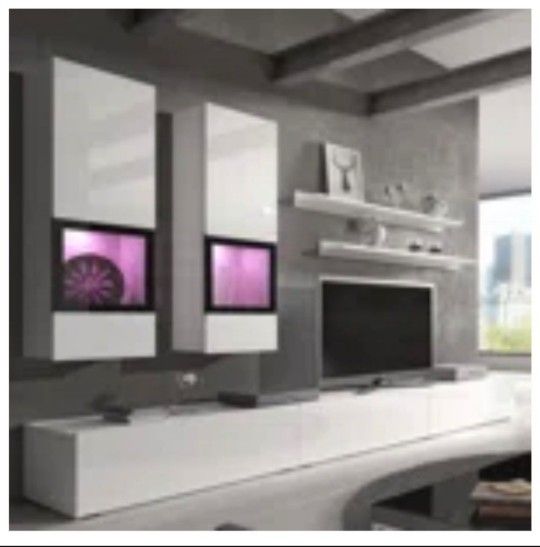 In Perfect Conditions Fits Up To 868n TV. Comes With Floating Book Shelves. Asking $150 Need It Gone ASAP