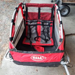 Single and double passenger children's foldable toe behind bike trailer with storage