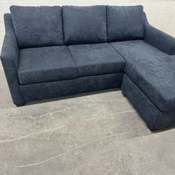 Free Delivery* Brand New Living Spaces Sofa W/ Reversible Chaise
