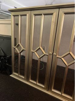 Gold/mirrored tv cabinet for the wall