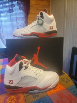 Air Jordan 5 Retro OG in the "Fire Red" colorway, specifically with a black