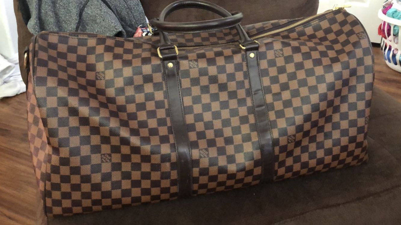Unauthentic Louis Vuitton duffle bag
