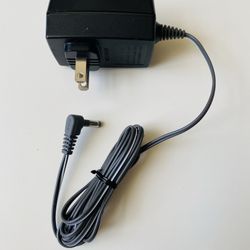 Genuine Panasonic AC Adaptor. PQLV 219. I.T.E. Power Supply. Input: 100-120V. 60Hz. 100 mA. Output: 6.5V. 500 mA. New. Never used.