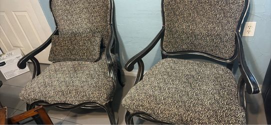 Matching set of wood framed lounge chairs