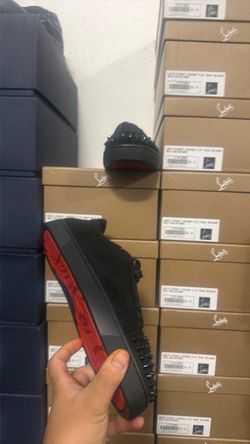 Louboutins red bottoms men