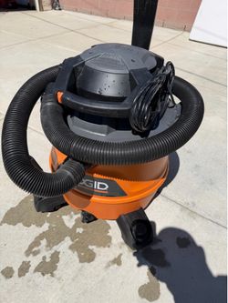 Rigid vacuum with blower
