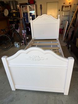 Bed frame twin size  with trundle at bottom