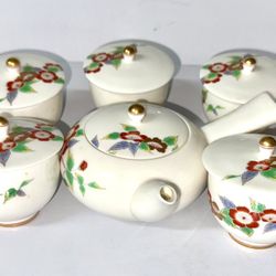 Fukagawa Seiji Arita Ware tea set, which includes a teapot and five teacups with lids.