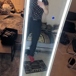 Illuminating Self Standing Mirror About 5 1/2 Foot Tall 