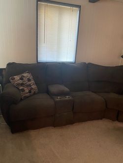 Couch and 65-inch TV