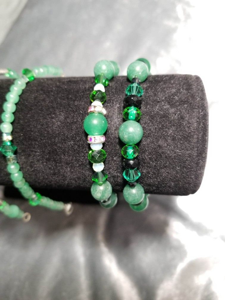 Assorted green gemstone bracelets (green adventurine and jade with czech glass and Swarovski beads).
Size small.
Clasp closure and stretch available.
