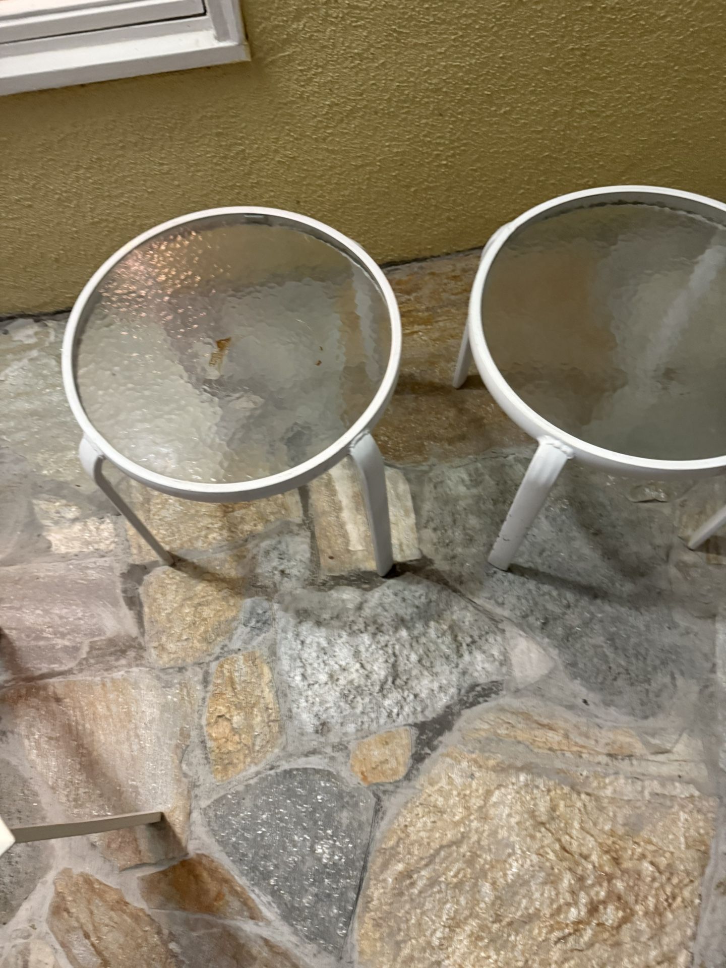 Two Round Glass Top Patio Tables