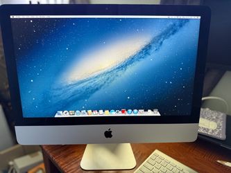 Apple iMac with Magic Mouse and Keyboard