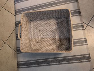 Set of 4 white wicker Pottery Barn baskets