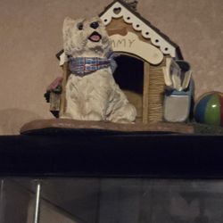 Dog and dog house figurine