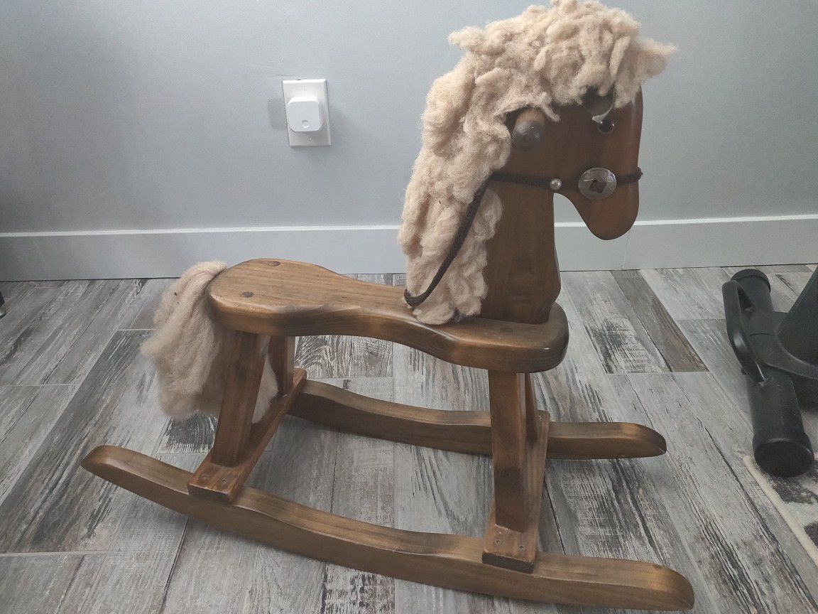 Wooden rocking horse for young children