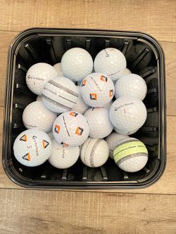 Golf balls TaylorMade TP5 and Tour response