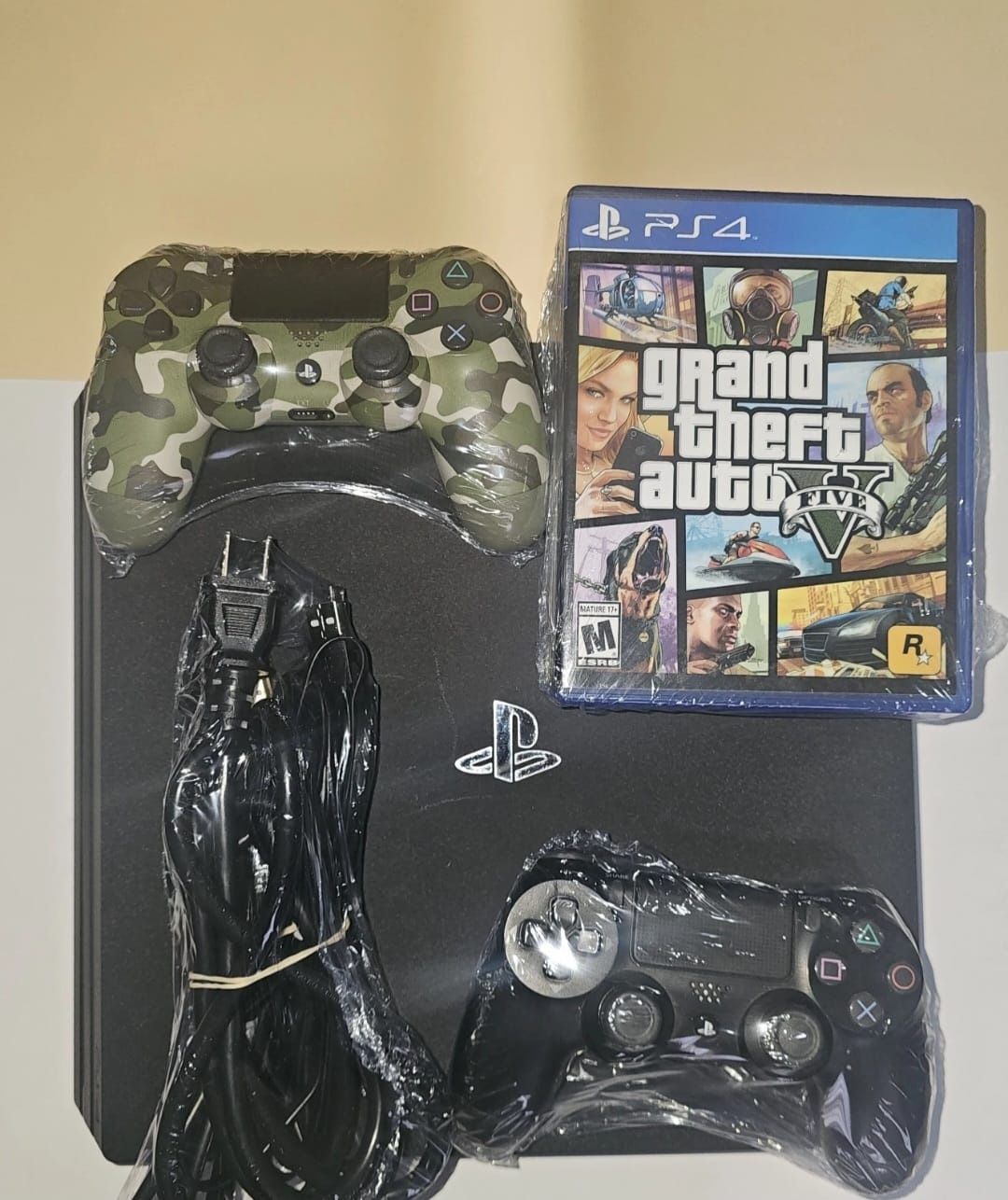 For sale PlayStation 4 like new with 3 game CDs with 2 DualShock PlayStation 4 ,,,, 350$
