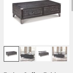 Coffe Table Also Can Bring It Up Like A Desk 