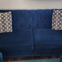 Royal blue suede sofa and loveseat