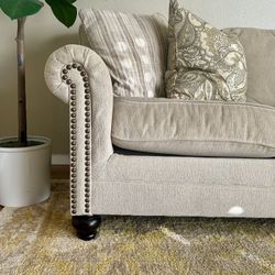 Beige Couch And Coordinating Arm Chair