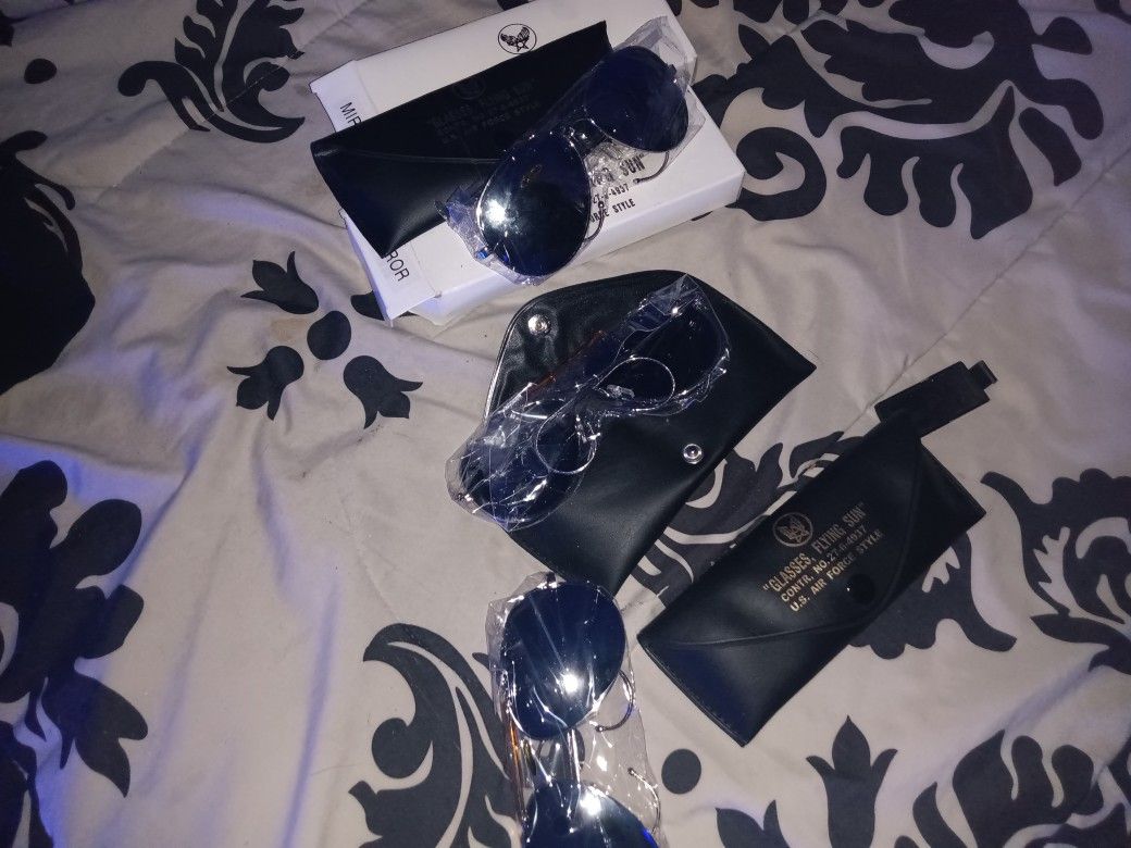 "GLASSES, FLYING SUN
8.3 AIN FORCE STILE