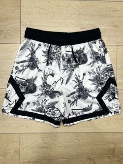 Jordan Men's Sport Dri-FIT Woven Diamond Shorts in a white floral printed colorway