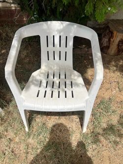 White outdoor plastic patio chair