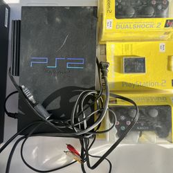 PS2 W/ 2 Dual Shocker Controllers & 8mb Memory Card
