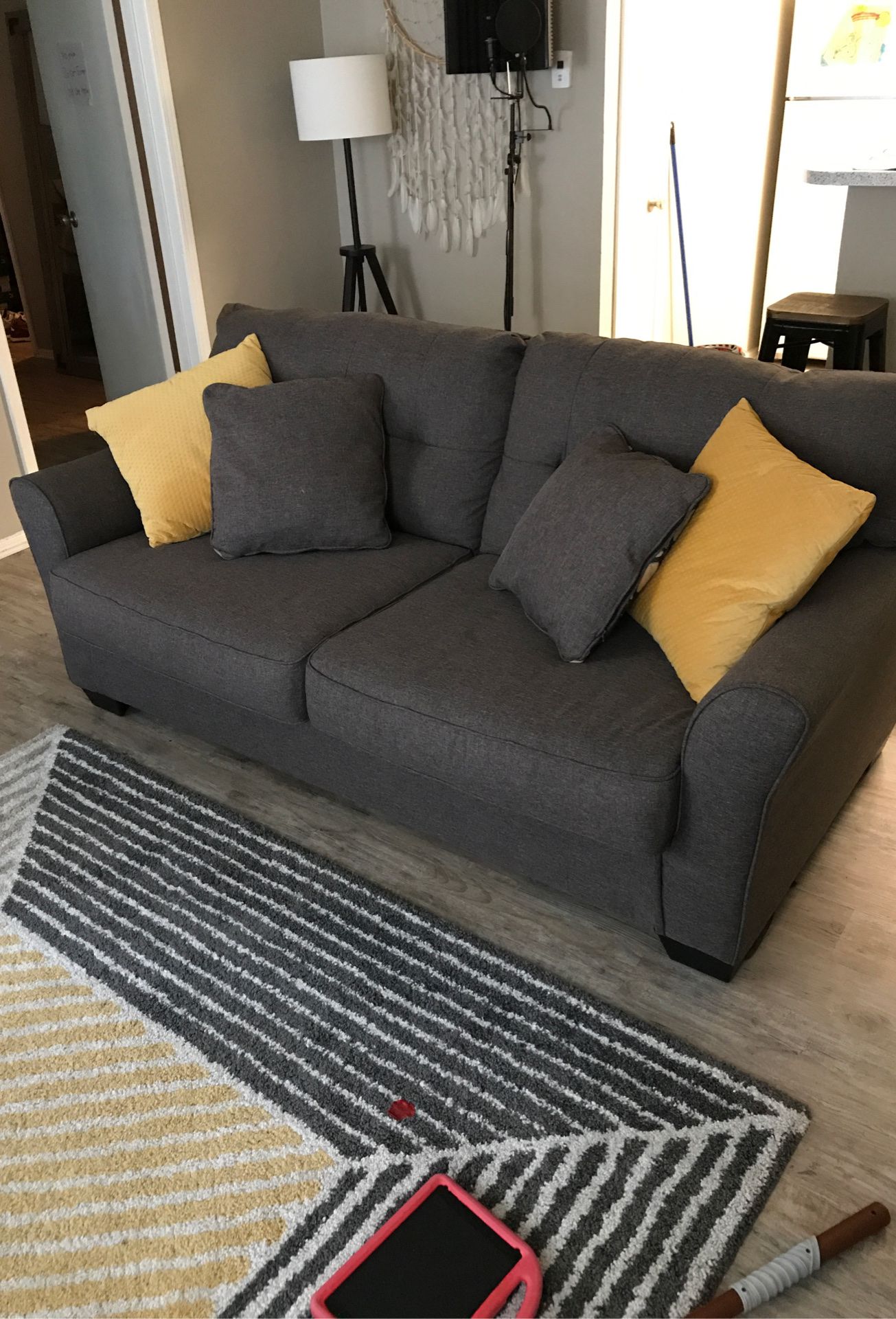 Sofa bed ! Gray new condition by: Ashley furniture