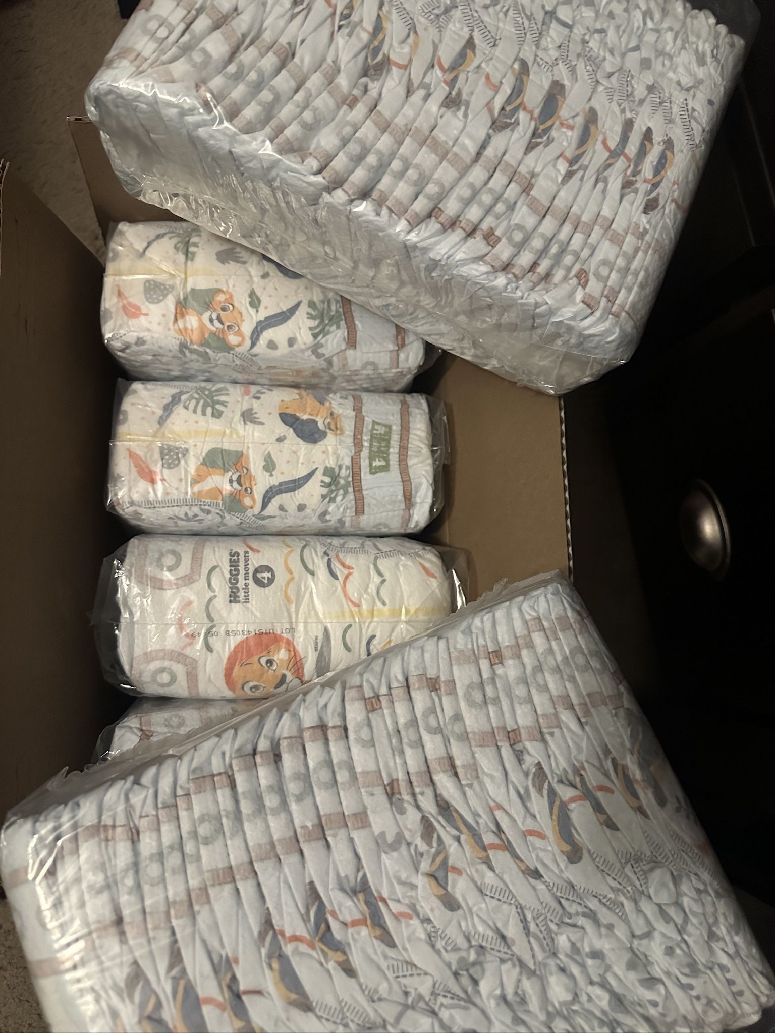 Huggies Brand New Diapers Size 4 240 In Total. Size 5 Has About 100.
