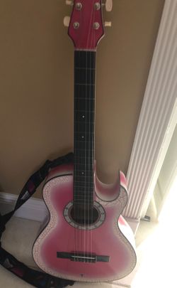 Acoustic guitar with cover