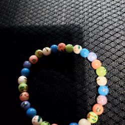 Beautiful Hand Made Clay Bead Braclet. size med