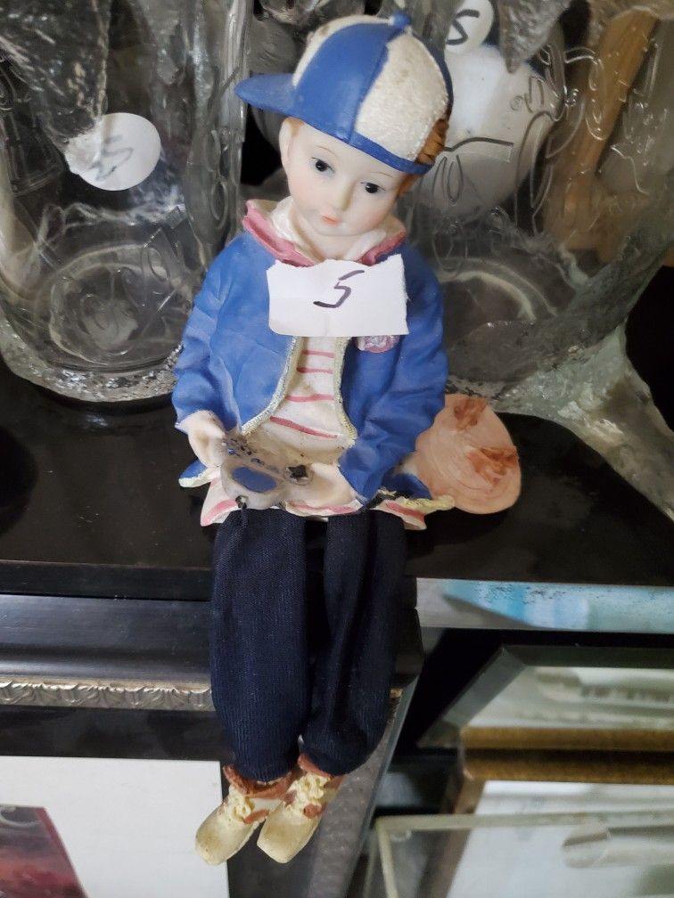 Ceramic Boy With Game Legs Dangle Decor
