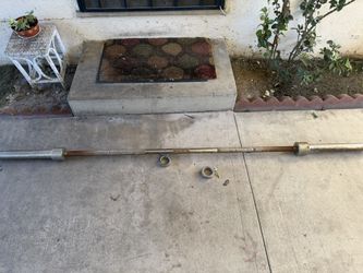 Olympic Bar With Clips 7 Foot Long 45 Lbs