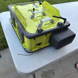 The image shows a Ryobi Ultra-Quiet 2 HP Belt Drive Garage Door Opener. 
