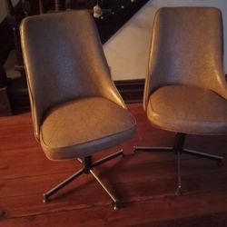 2 Vintage Swivel Chairs