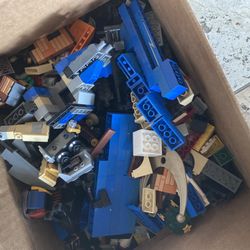 Approximately 14 pounds of LEGO and perhaps some other building bricks blocks toys toy 