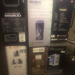 7 computer cases a bunch of laptops for parts A Few motherboards and laptop screens