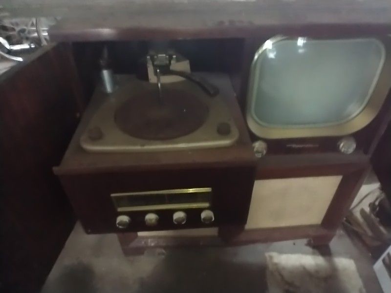 Vintage Motorola TV Cabinet With Roll out Record player And Speaker Box.
