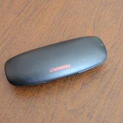Carerra clam shell sunglasses eyeglasses hard case. Black. Case only. 
Pre-owned, very good shape, please see photos for details.
Would fit small to m