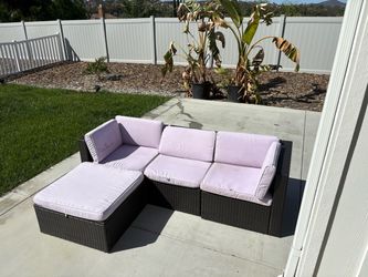 Wicker patio lounge set - comes with extra set of beige covers