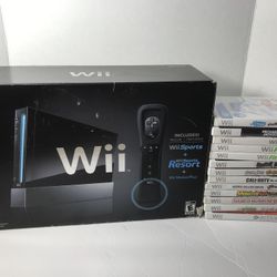 Wii in box complete + 13 games wii sports
