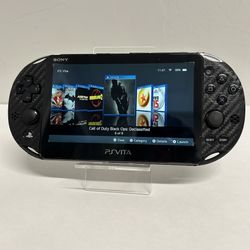 Psvita 2000 Slim Model W/ Skin + 12,000+ Games!!