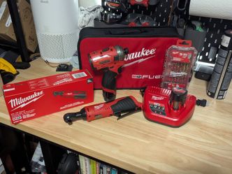 Milwaukee M12 1/4" hex impact, 3/8" ratchet, two batteries, charger and drill bit set