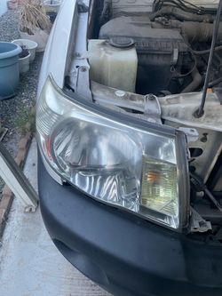 Passenger side headlight 2009 Toyota Tacoma