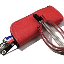 Red folding reading glasses able to attach to purse, etc.