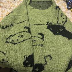 Cute green sweater with cats