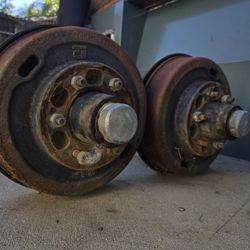 6 lug trailer axles with brakes and 5 tires 